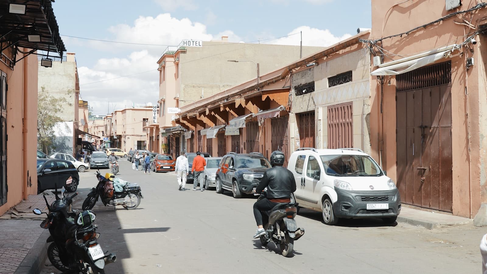 Sun-baked Marrakech street under intense summer heat, Morocco