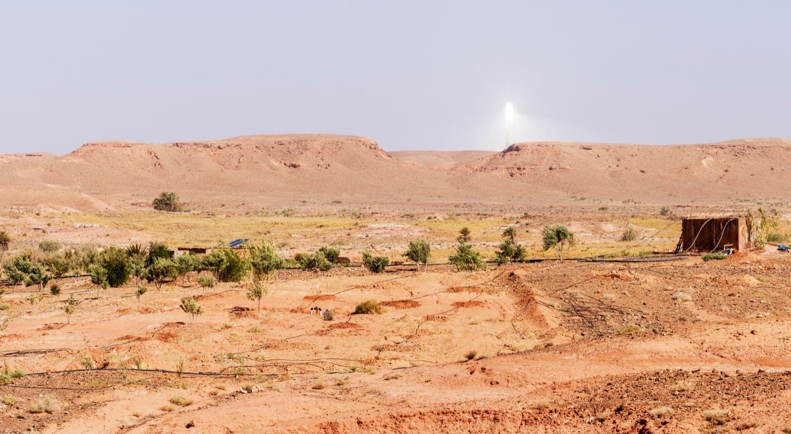 Concentrating solar power tower in the Moroccan desert, emblematic of the country's renewable energy ambitions under the 2030 target